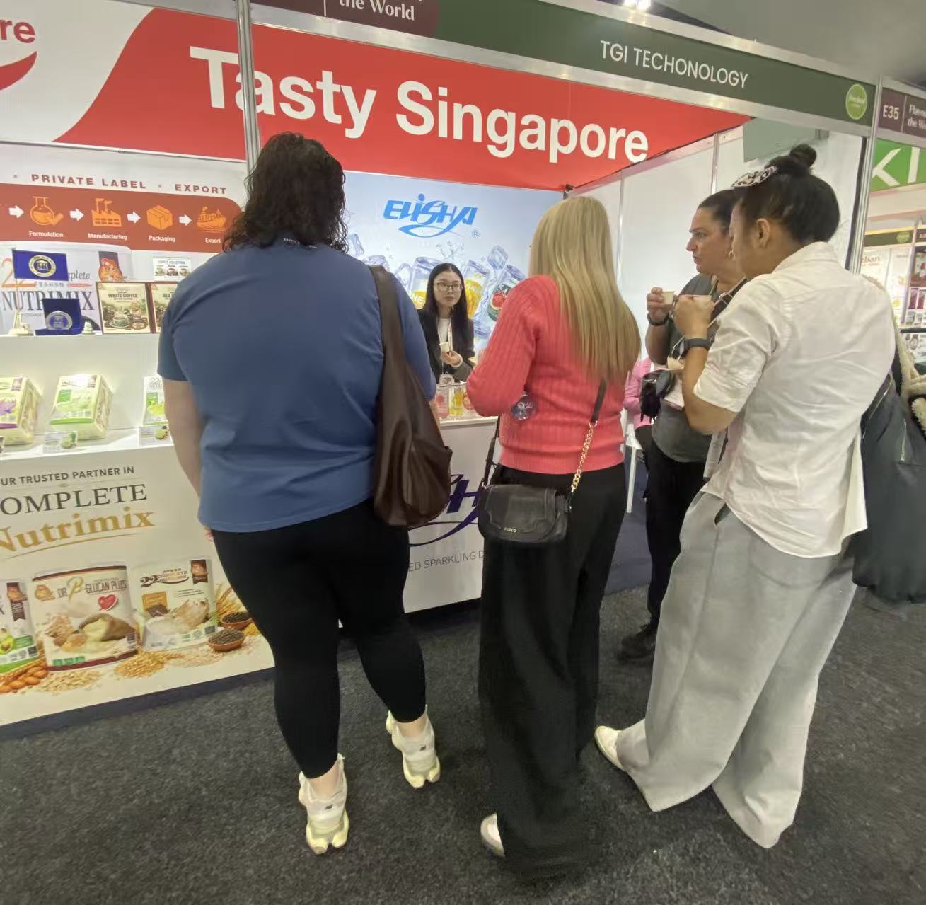 Customers who are trying out Elisha flavored soda.jpg Customers who are trying out Elisha flavored soda.jpg